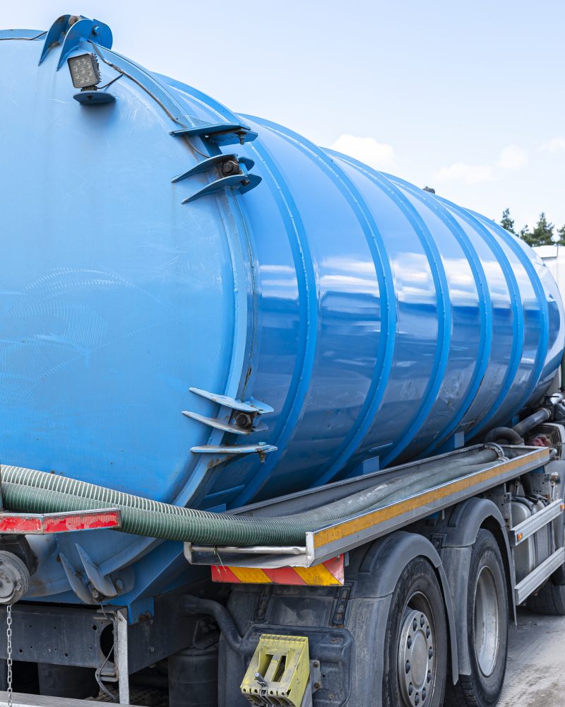 A truck with a large tank for pumping out a septic tank with a capacity of more than 20 cubic meters.